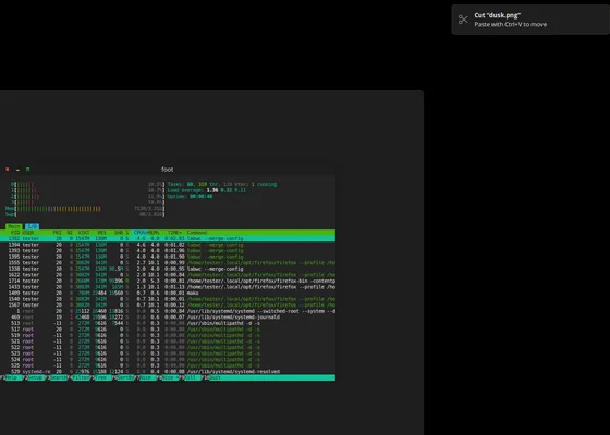 The foot terminal running htop, with a notification in the corner reading Cut “dusk.png”, paste with Ctrl+V to move.